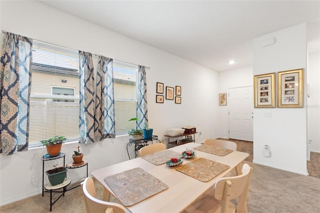 5816 Beefmaster Rd, Saint Cloud, FL 34771 - dining space with light carpet, baseboards, and recessed lighting