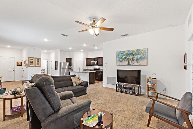 5816 Beefmaster Rd, Saint Cloud, FL 34771 - living room featuring ceiling fan, light carpet, recessed lighting, and baseboards