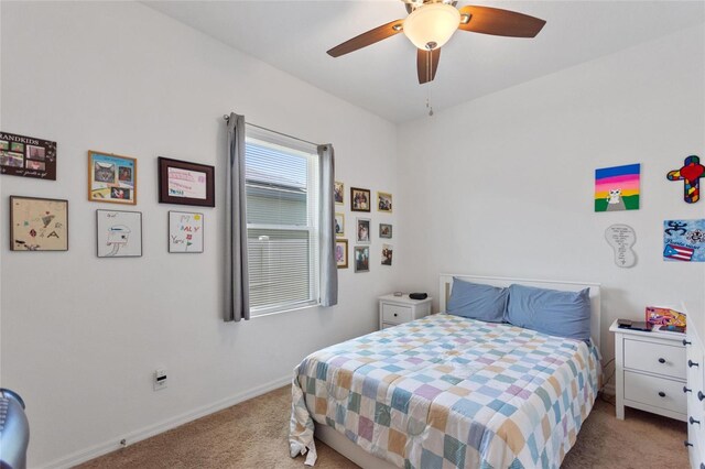 5816 Beefmaster Rd, Saint Cloud, FL 34771 - carpeted bedroom with baseboards and ceiling fan