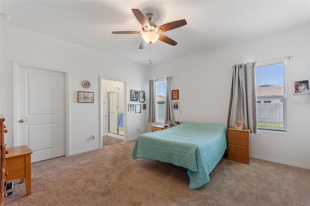 5816 Beefmaster Rd, Saint Cloud, FL 34771 - carpeted bedroom with baseboards, a ceiling fan, and ensuite bath