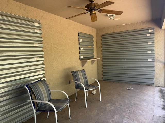 view of patio with ceiling fan