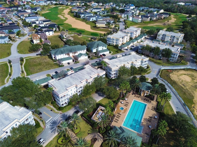 bird's eye view with view of golf course