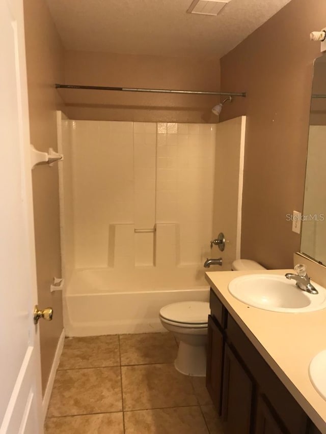 3102 Westbrook Rd, Kissimmee, FL 34746 - bathroom featuring a sink, toilet, bathing tub / shower combination, tile patterned floors, and double vanity