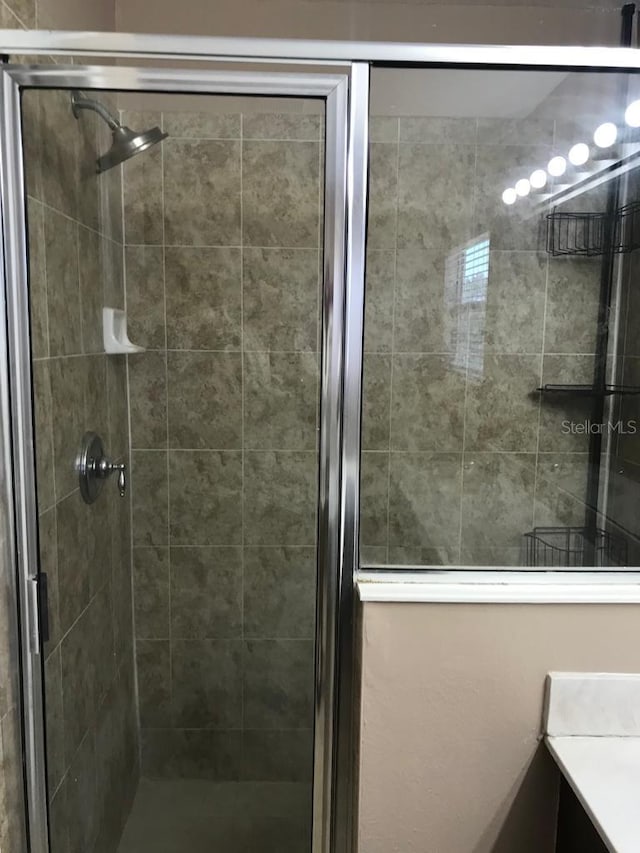 3102 Westbrook Rd, Kissimmee, FL 34746 - full bath featuring vanity and a shower stall