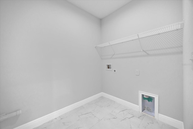 laundry room with electric dryer hookup, laundry area, washer hookup, baseboards, and marble finish floor