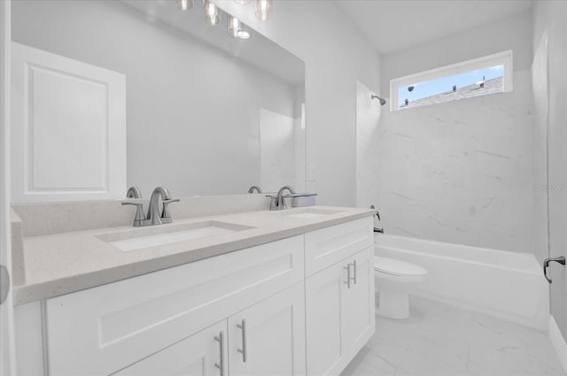 full bathroom with marble finish floor, bathtub / shower combination, double vanity, and a sink