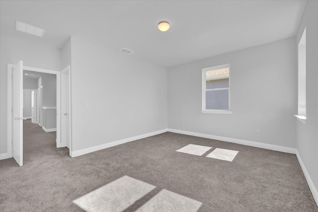 unfurnished bedroom with visible vents, baseboards, and carpet floors