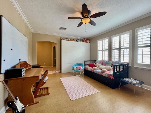 907 Pawstand Rd, Celebration, FL 34747 - bedroom featuring arched walkways, multiple windows, crown molding, a textured ceiling, and baseboards