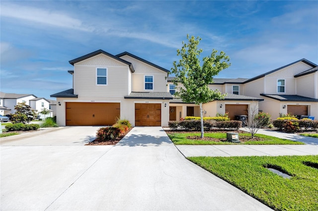 5424 Companion Ln, Tampa, FL 33619 - view of front of home featuring an attached garage, driveway, a residential view, and stucco siding