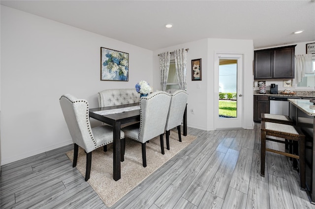 5424 Companion Ln, Tampa, FL 33619 - dining space with light wood finished floors, baseboards, and recessed lighting