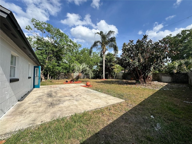 1098 Leeway Ct, Orlando, FL 32810 - view of yard featuring a patio and a fenced backyard