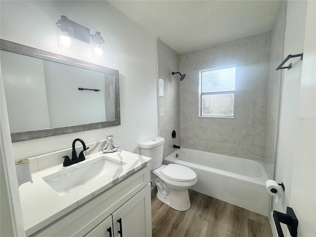 1098 Leeway Ct, Orlando, FL 32810 - full bathroom featuring toilet, wood finished floors, vanity, and shower / washtub combination
