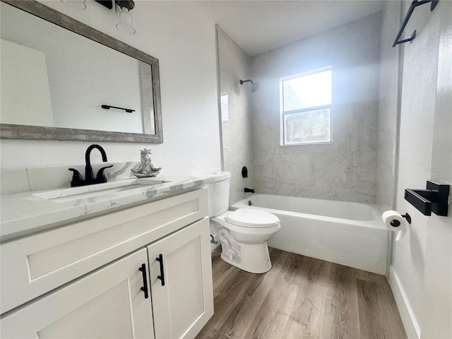 1098 Leeway Ct, Orlando, FL 32810 - full bathroom featuring vanity, shower / tub combination, toilet, and wood finished floors