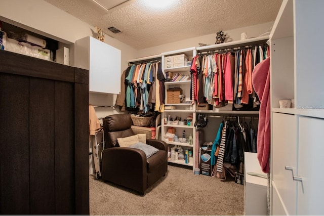 walk in closet with carpet flooring and visible vents