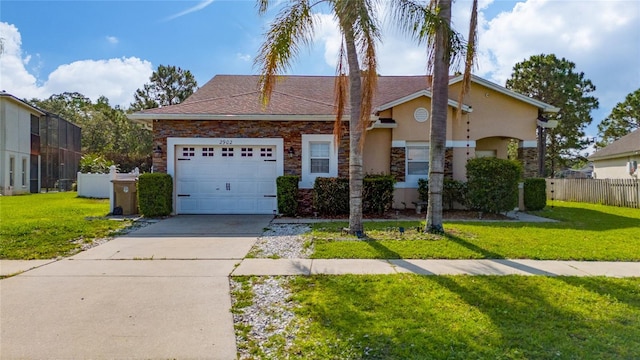 2902 Paddington Way, Kissimmee, FL 34747 - view of front of property featuring a garage, driveway, stucco siding, and a shingled roof