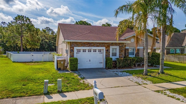 2902 Paddington Way, Kissimmee, FL 34747 - view of front of house featuring concrete driveway, an attached garage, stone siding, and roof with shingles
