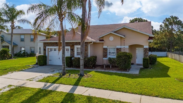 2902 Paddington Way, Kissimmee, FL 34747 - view of front of property featuring a garage, stucco siding, concrete driveway, stone siding, and a shingled roof