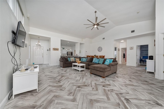 2902 Paddington Way, Kissimmee, FL 34747 - living area featuring a ceiling fan, high vaulted ceiling, and baseboards