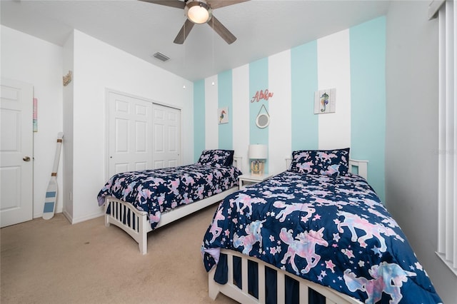 2902 Paddington Way, Kissimmee, FL 34747 - bedroom featuring carpet, a closet, and a ceiling fan