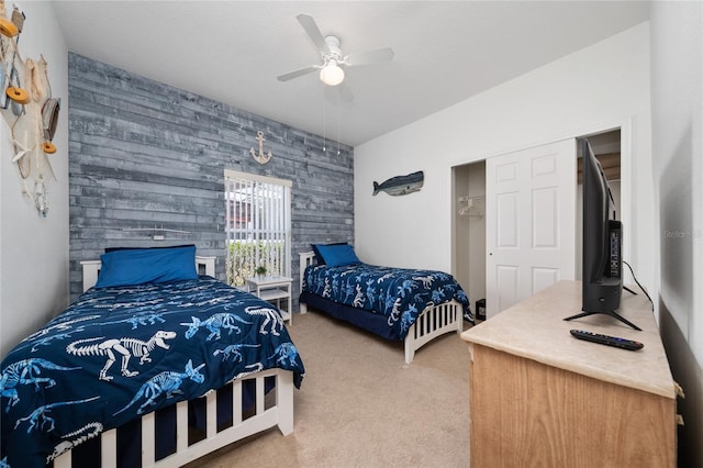 2902 Paddington Way, Kissimmee, FL 34747 - bedroom with an accent wall, carpet floors, and a ceiling fan