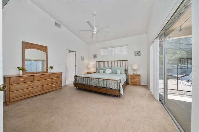 2902 Paddington Way, Kissimmee, FL 34747 - bedroom featuring light carpet, access to outside, high vaulted ceiling, and a ceiling fan