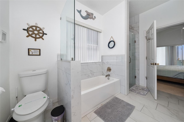 2902 Paddington Way, Kissimmee, FL 34747 - full bathroom with ensuite bath, marble look tile flooring, a stall shower, a bath, and toilet