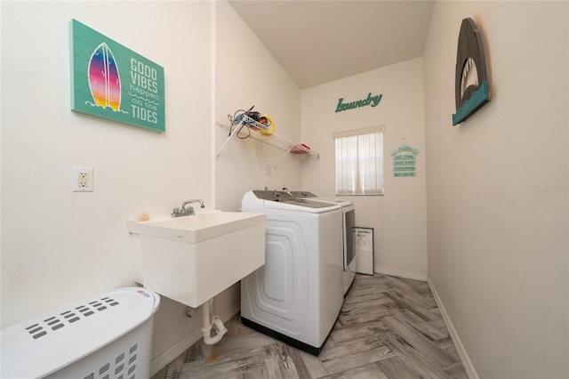 2902 Paddington Way, Kissimmee, FL 34747 - laundry room with separate washer and dryer and baseboards