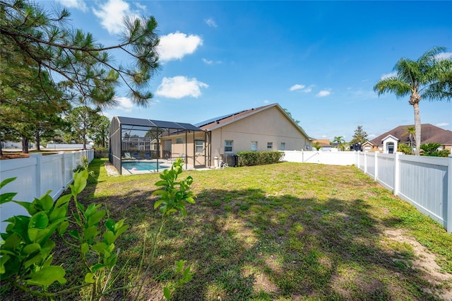 2902 Paddington Way, Kissimmee, FL 34747 - view of yard with a lanai
