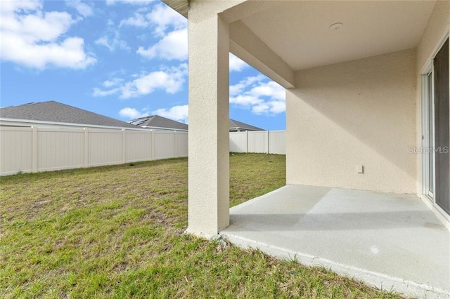 view of yard featuring a fenced backyard and a patio