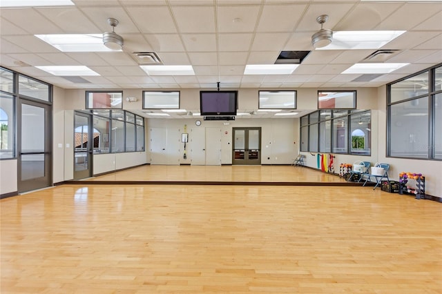 exercise area with wood finished floors