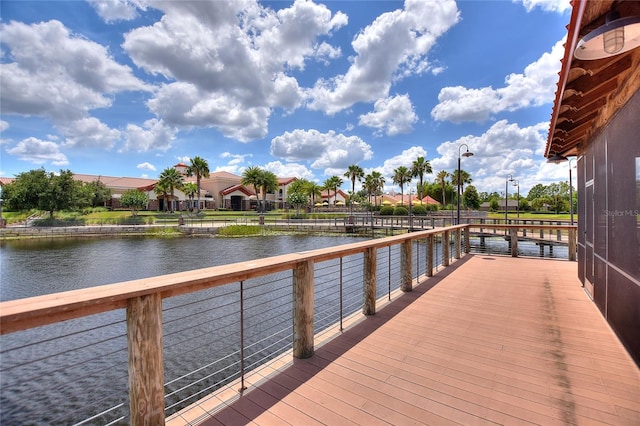 dock area with a water view