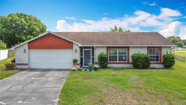 3110 Short Leaf Pine Ct, Kissimmee, FL 34746 - view of front of house featuring stucco siding, driveway, an attached garage, and roof with shingles