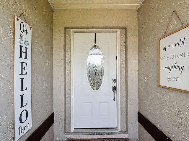 3110 Short Leaf Pine Ct, Kissimmee, FL 34746 - view of exterior entry featuring stucco siding