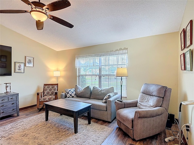 3110 Short Leaf Pine Ct, Kissimmee, FL 34746 - living area with wood finished floors, a ceiling fan, vaulted ceiling, and a textured ceiling