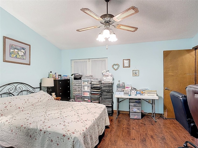 3110 Short Leaf Pine Ct, Kissimmee, FL 34746 - bedroom with wood finished floors, ceiling fan, baseboards, a closet, and a textured ceiling