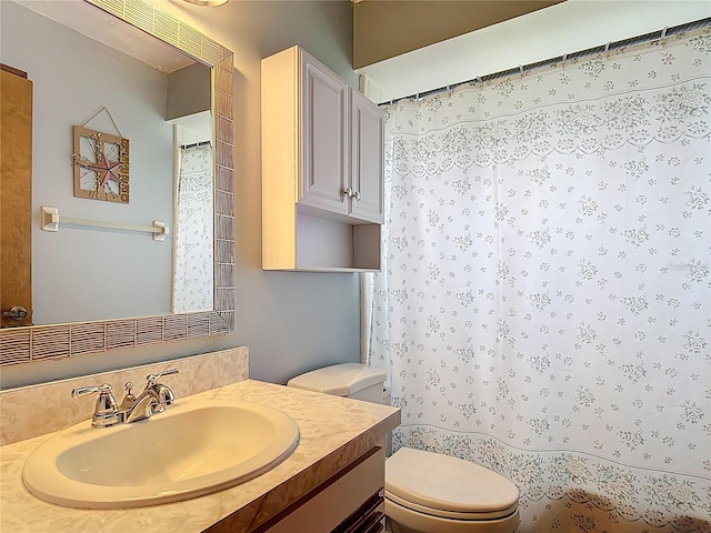 3110 Short Leaf Pine Ct, Kissimmee, FL 34746 - bathroom with toilet, vanity, and a shower with shower curtain