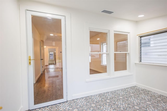 1007 11th St, Saint Cloud, FL 34769 - interior space with a healthy amount of sunlight, baseboards, visible vents, and recessed lighting