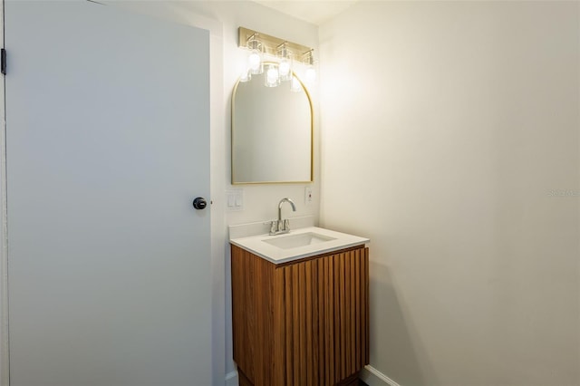 1007 11th St, Saint Cloud, FL 34769 - bathroom with baseboards and vanity