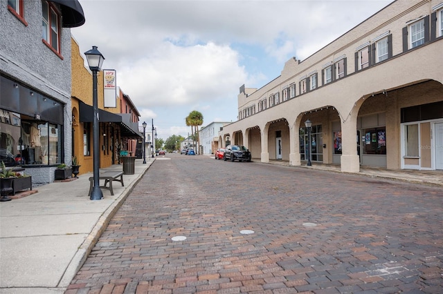 1007 11th St, Saint Cloud, FL 34769 - view of street featuring street lighting, curbs, sidewalks, and a residential view