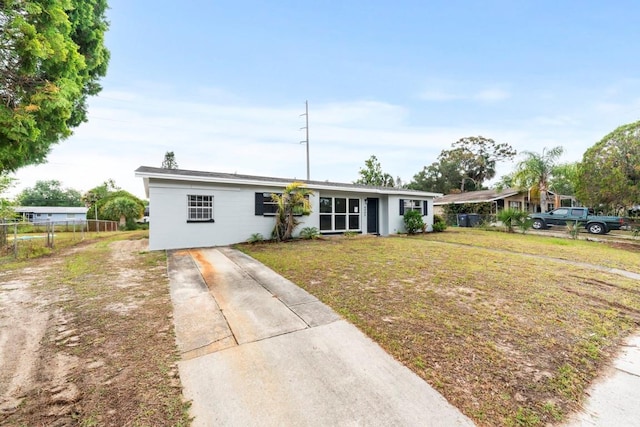 4445 Stuart Ave, Titusville, FL 32780 - view of front of house with driveway