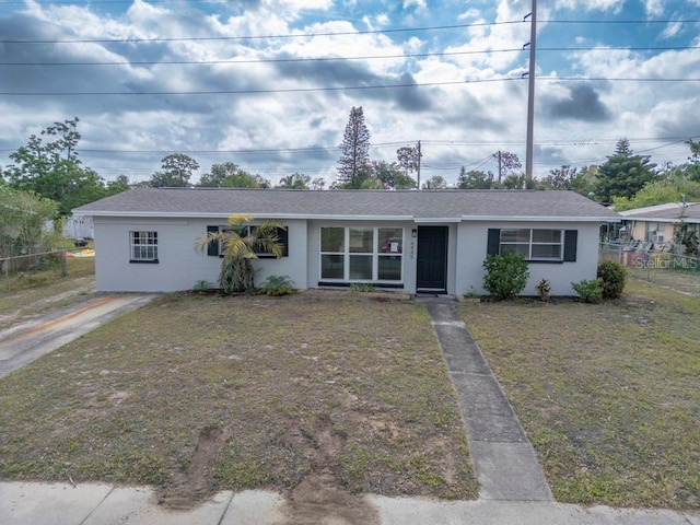4445 Stuart Ave, Titusville, FL 32780 - ranch-style home featuring stucco siding