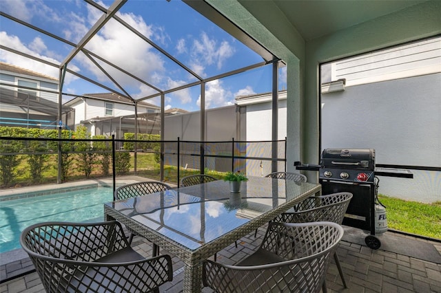 sunroom / solarium featuring outdoor dining space