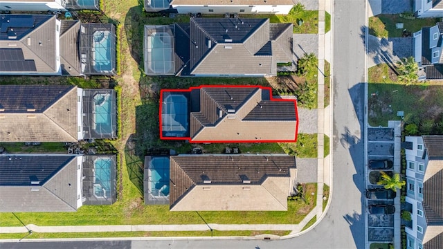 aerial perspective of suburban area with property boundaries highlighted