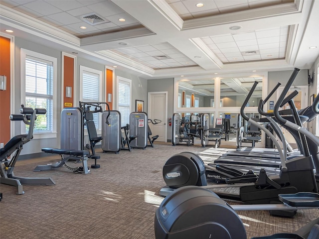 gym with plenty of natural light, baseboards, carpet flooring, coffered ceiling, and crown molding
