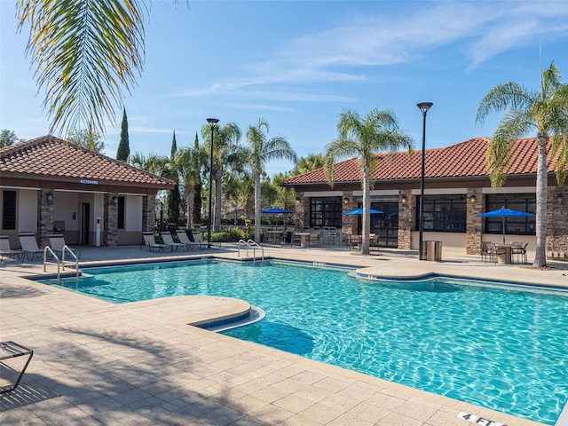 community pool featuring a patio