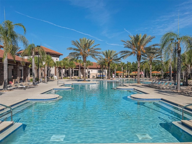 community pool with a patio