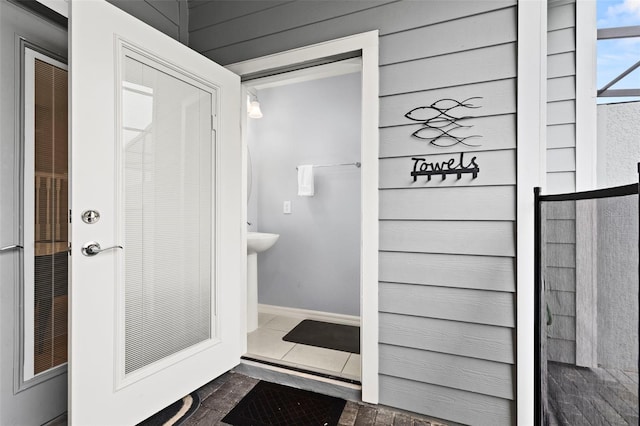 bathroom with tile patterned flooring