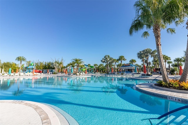 community pool with a patio area