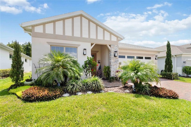 view of front facade featuring a garage, decorative driveway, stucco siding, and a front lawn