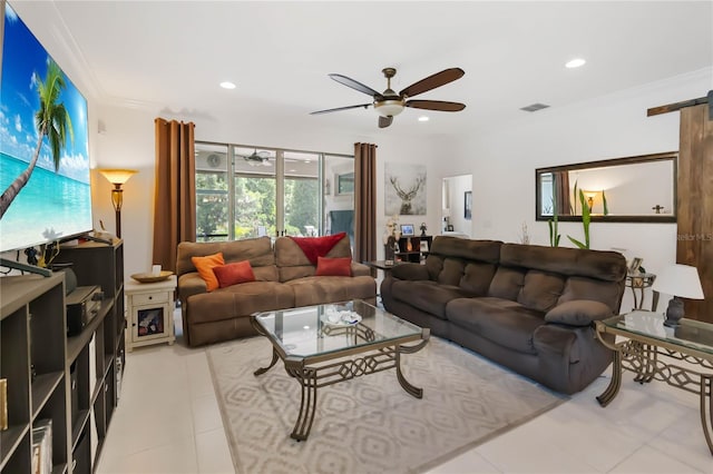 living room featuring a ceiling fan, a barn door, light tile patterned floors, and recessed lighting